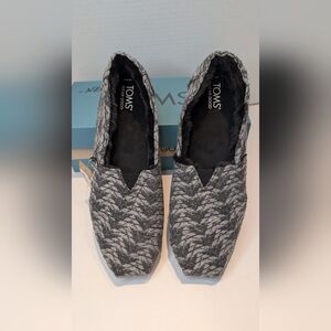 TOMS Charcoal and Black Patterned Slip-Ons With Faux Fur Lining